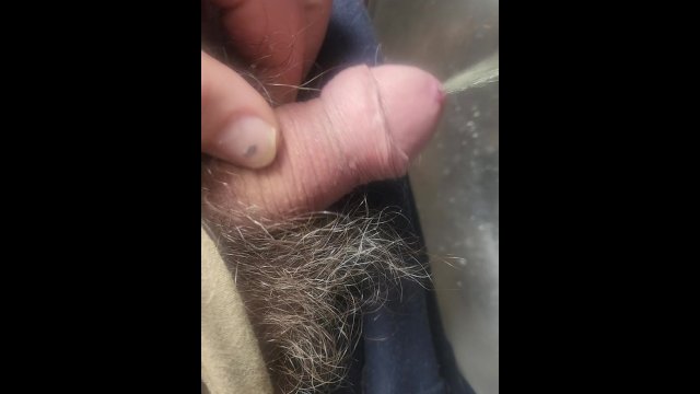 Pissing in a steel bowl