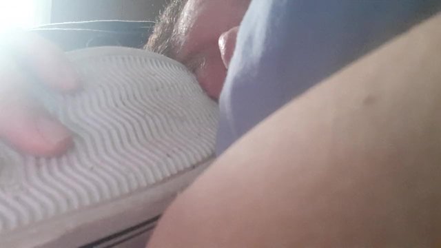 Relaxing while licking a shoe