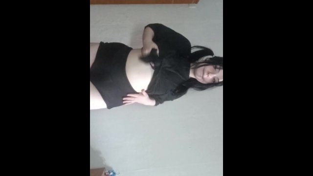 An aroused woman in a caress.